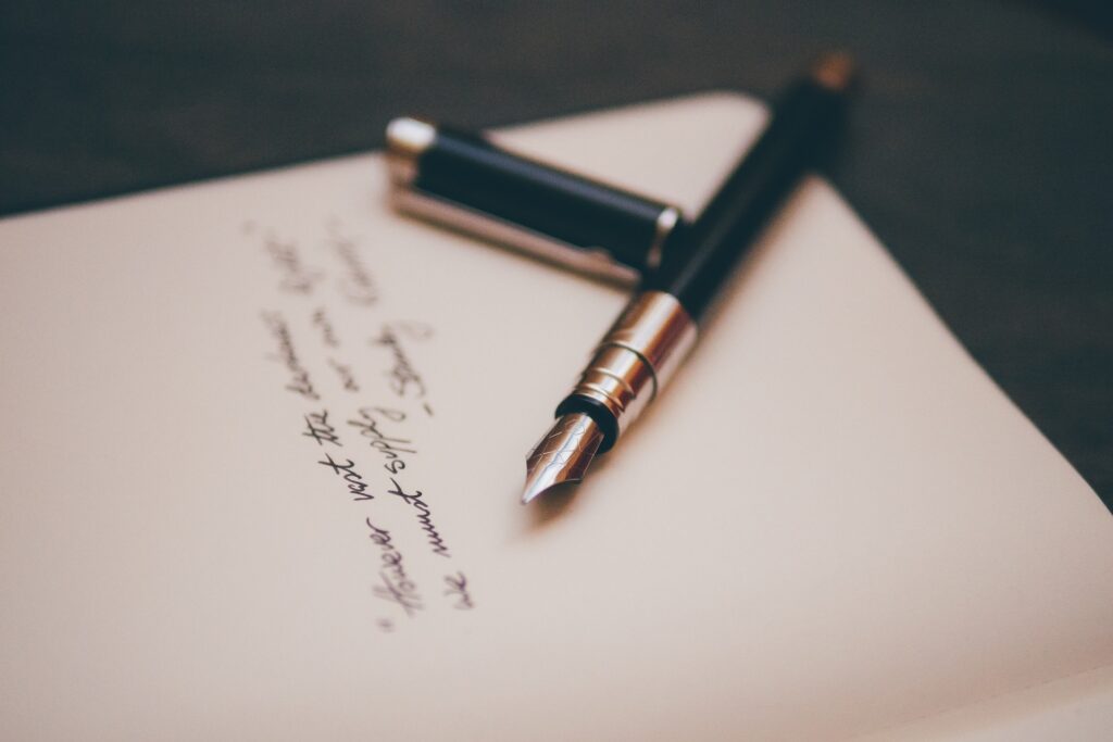 fountain pen on handwritten letter